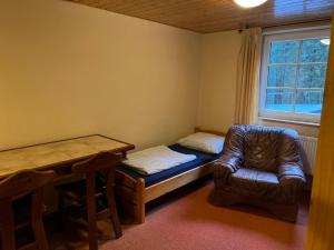 Tempat tidur dalam kamar di Kamenný Mlýn