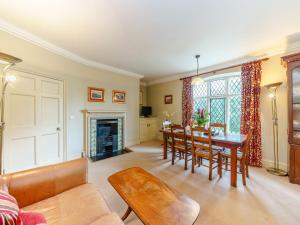 a living room with a table and a dining room at Sir Henry Sidney-ukc4033 in Ludlow