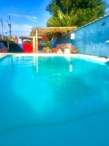 Бассейн в Suites piscina Búzios или поблизости
