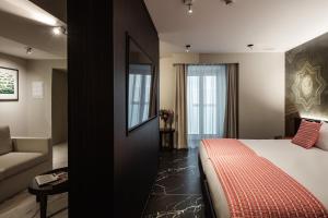 Postel nebo postele na pokoji v ubytování Melior Boutique Hotel