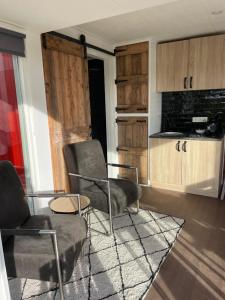 Φωτογραφία από το άλμπουμ του Containerwoning op schitterende locatie σε Milsbeek +10 φωτογραφίες