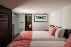 Postel nebo postele na pokoji v ubytování Melior Boutique Hotel