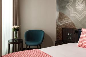 Postel nebo postele na pokoji v ubytování Melior Boutique Hotel