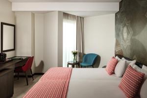 Postel nebo postele na pokoji v ubytování Melior Boutique Hotel