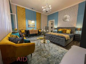 Postel nebo postele na pokoji v ubytování V68 Design Apartment - hostAID