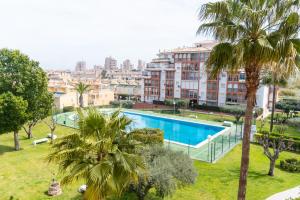 Bazén v ubytovaní Apartamento Torresol alebo v jeho blízkosti