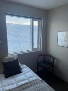 Cama o camas de una habitación en Óspaksstaðir- New Renovated Farm in Hrútafjörður