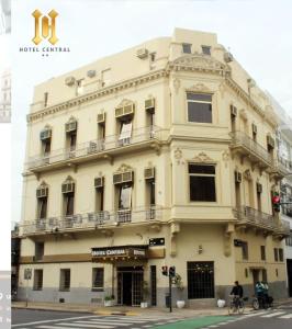 a large building on the corner of a street at Hotel Central in Buenos Aires