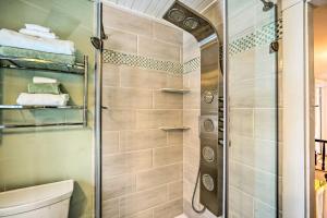 a shower with a glass door in a bathroom at Historic Mount Holly Vacation Rental in Hortonville +31 photos