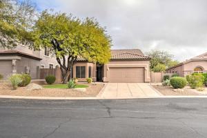 a house with a tree and a garage at Private Pool and Community Perks Mesa Home! in Mesa