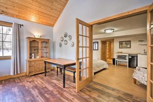 a bedroom with a desk and a bed in a room at Secluded Ellsworth Apartment - Hiking Nearby! 