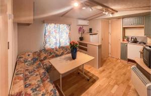 A kitchen or kitchenette at Beautiful StaCaravan