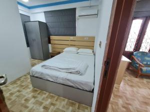 Postel nebo postele na pokoji v ubytování Villagewaves
