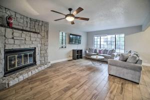 a living room with a couch and a fireplace at Pet-Friendly Hollister Getaway with Grill! in Hollister