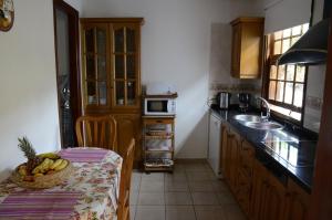 Kuchyň nebo kuchyňský kout v ubytování Las Casitas - Bung. A + 3 fotografie