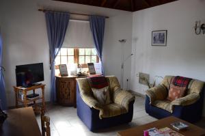 TV a/nebo společenská místnost v ubytování Las Casitas - Bung. A