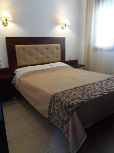 Voodi või voodid majutusasutuse Villa Gialos Ηλέκτρα toas