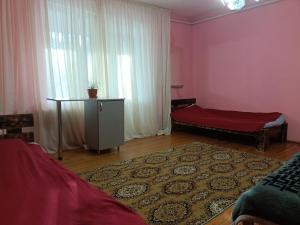 Postel nebo postele na pokoji v ubytování Krone Hostel