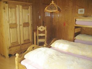 Letto o letti in una camera di Logis de la Licorne