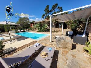 Bazén v ubytovaní Casa Salya 8 pers Piscine privée Chauffée San Cipriano alebo v jeho blízkosti