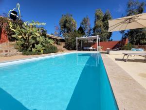Bazén v ubytovaní Casa Salya 8 pers Piscine privée Chauffée San Cipriano alebo v jeho blízkosti