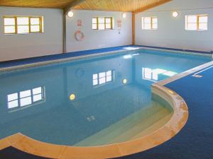 a large swimming pool in a house at Mad Nelly Cottage in Moreleigh