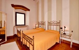 เตียงในห้องที่ Villa Ari, la tua villa in Toscana