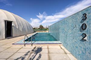 Bazén v ubytování Nirvana Retreat By Patanjali Wellness Initiative nebo v jeho okolí