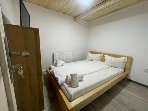 Postel nebo postele na pokoji v ubytování Vila Rustik Straja