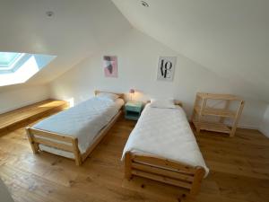 Posteľ alebo postele v izbe v ubytovaní Maisonnette confortable à Pornic
