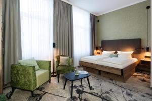 Postel nebo postele na pokoji v ubytování LIHO - einfach Lübeck + 37 fotografií