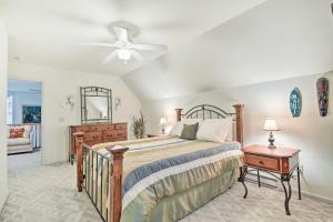 a bedroom with a bed and a dresser and a mirror at Lackawaxen Family Home with Lake Access! in Lackawaxen