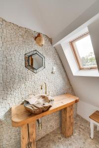 a bathroom with a sink and a window at Chyża Chata Górna 75m2 in Bystre