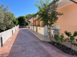 a walkway in front of a house at Case Vacanza Calabria Ionica in Cropani