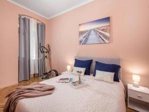Posteľ alebo postele v izbe v ubytovaní Apartman KARESA -Rijeka