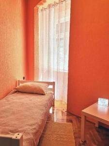 Posteľ alebo postele v izbe v ubytovaní Apartman KARESA -Rijeka