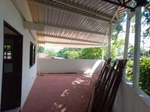 Ein Balkon oder eine Terrasse in der Unterkunft hospedaje Puerta Grande, tu casa en una habitación
