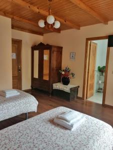 A bed or beds in a room at Casa Licerio