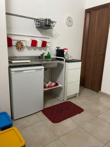 Kuchyňa alebo kuchynka v ubytovaní La Maison di Angela