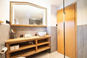 Koupelna v ubytování Gipfelstürmer + 24 fotografií