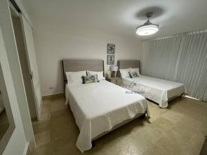 Exclusiva villa vacacional tesisinde bir odada yatak veya yataklar