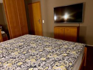 Cama o camas de una habitación en Ferienwohnung Mousse au Chocolat