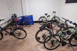a group of bikes parked in a garage at Number 15 Luxurious Two Bedroom Apartment in Exmouth