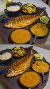 a table with many different dishes of food on at Marruá Hotel in Bonito