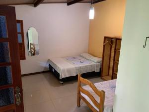 Postel nebo postele na pokoji v ubytování Pousada e Camping Lumiar