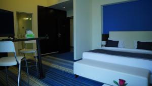 Postel nebo postele na pokoji v ubytování Monte Mare Hotel