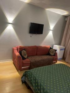 TV a/nebo společenská místnost v ubytování Appartement à 2 pas de la gare