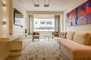 Area tempat duduk di Apartamento confortável e bem decorado a poucos passos da Beiramar Norte P1925