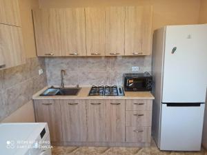 Kuchyň nebo kuchyňský kout v ubytování Bal's House + 17 fotografií