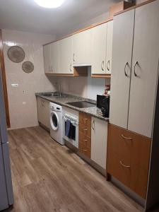 Kuchyňa alebo kuchynka v ubytovaní Apartamentos EL PELIGRO